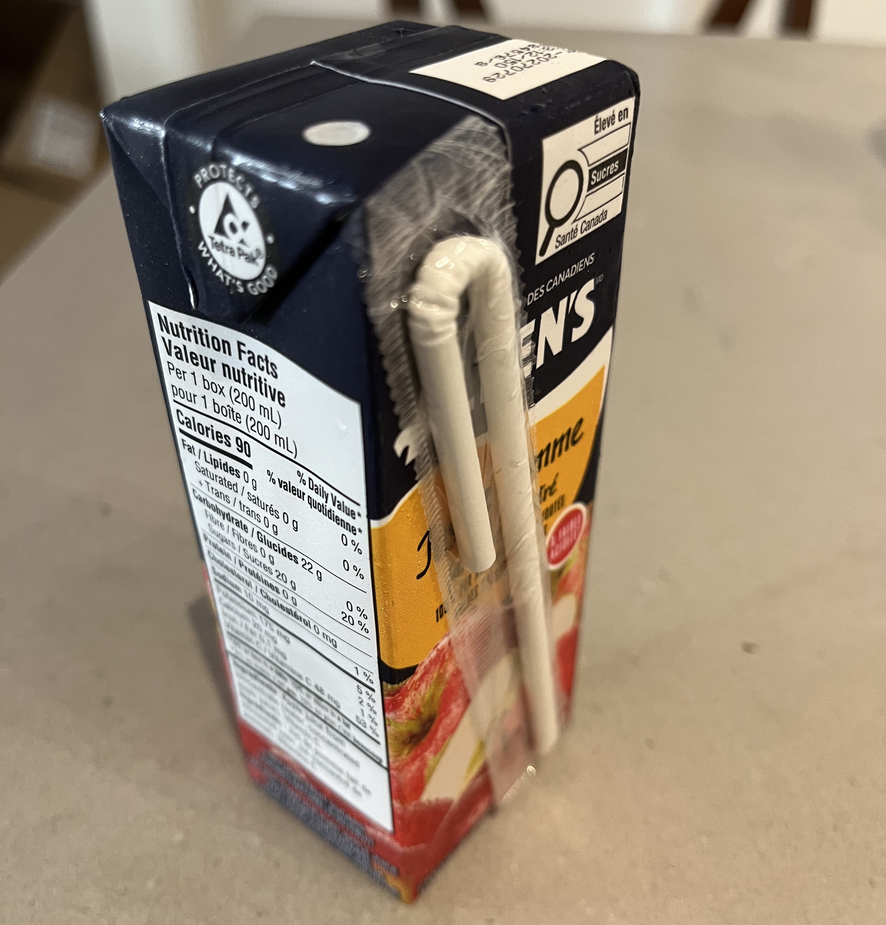 Angled view showing the side and straw